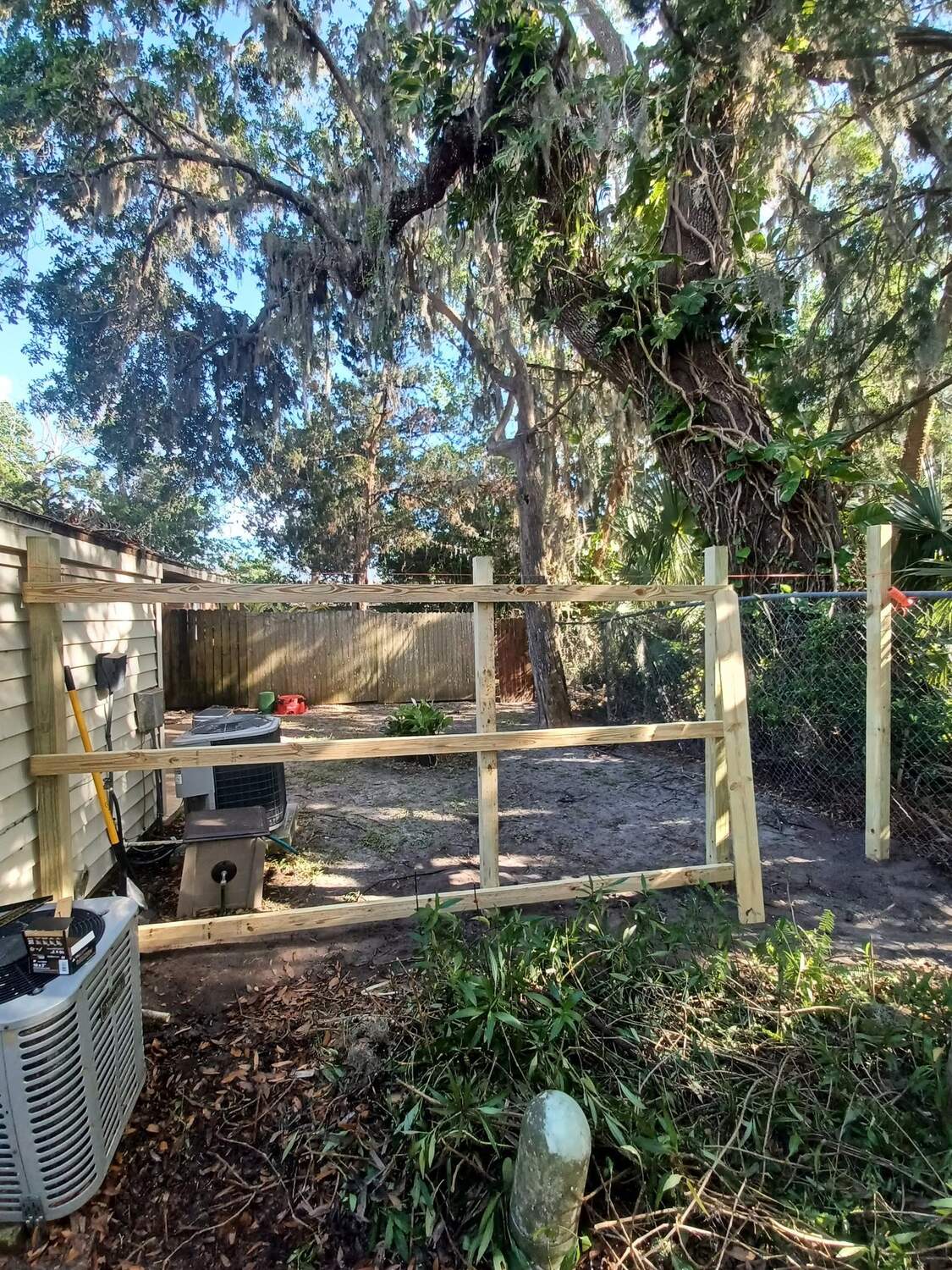 Custom wood fence build in progress