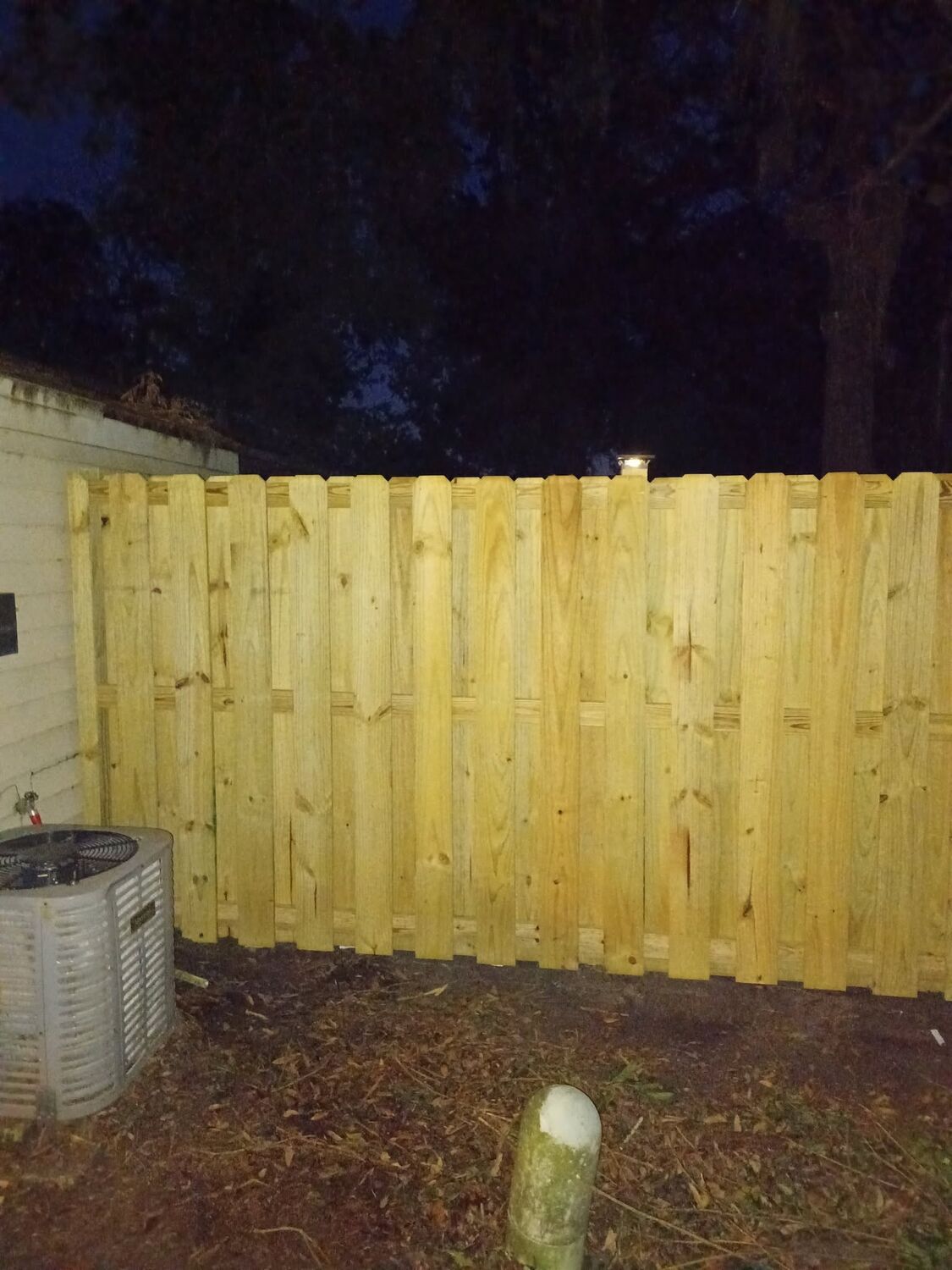 Custom wood fence installation