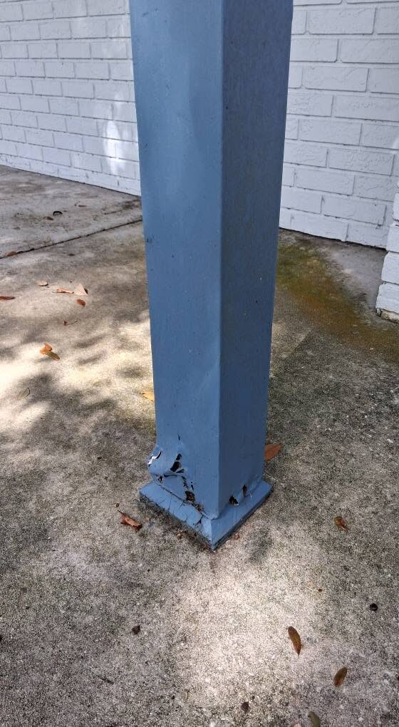 Damaged post base before repair by Dan's Service & Repair, LLC